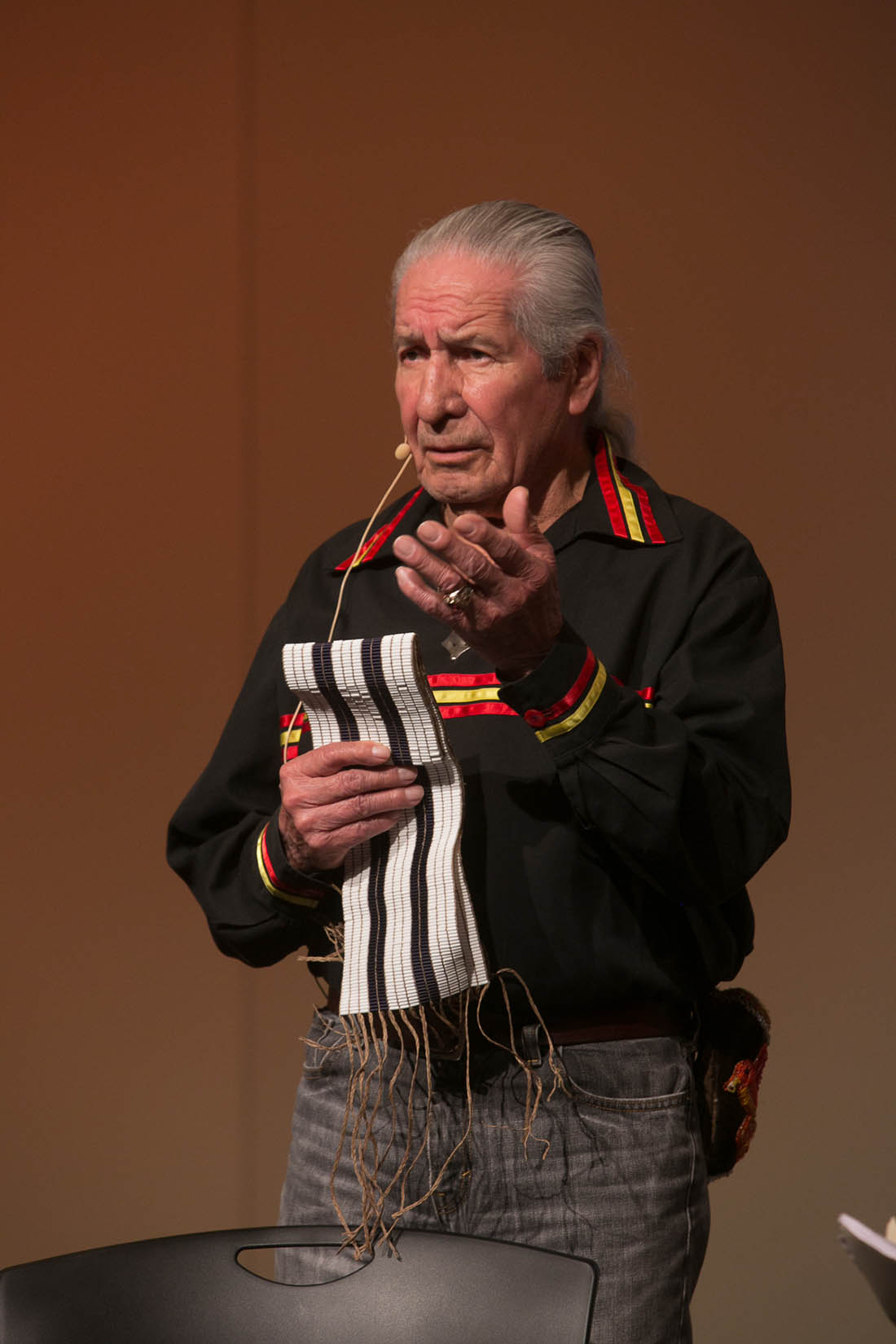 Oren Lyons Holding a Wampum Belt