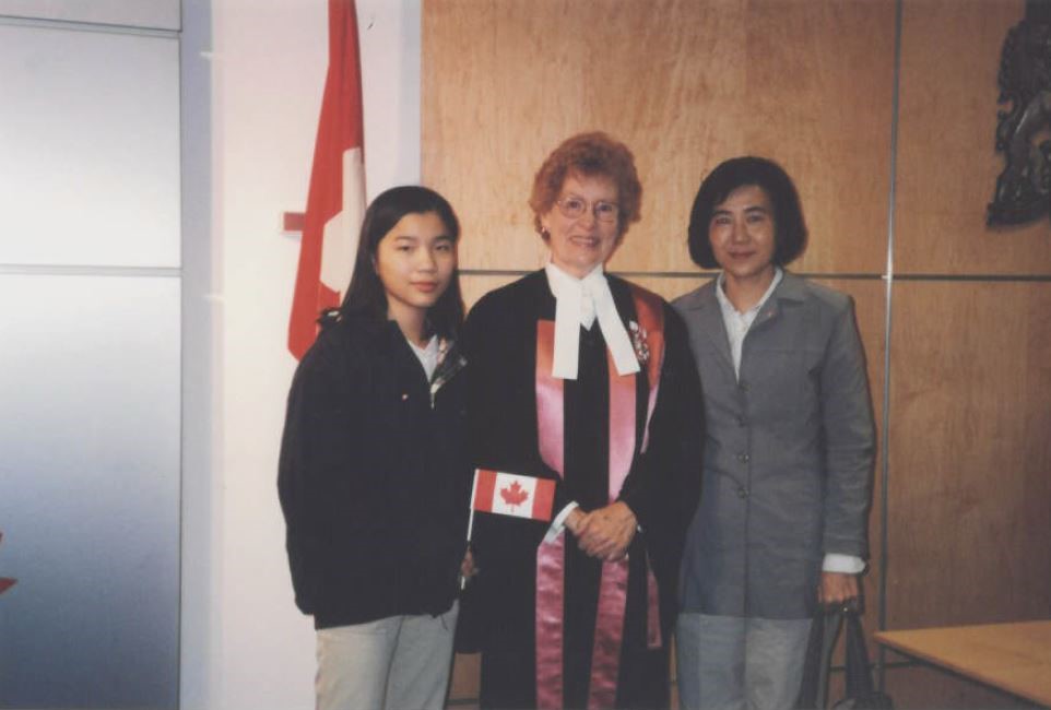 Two Taiwanese Canadian besides a Canadian citizenship judge