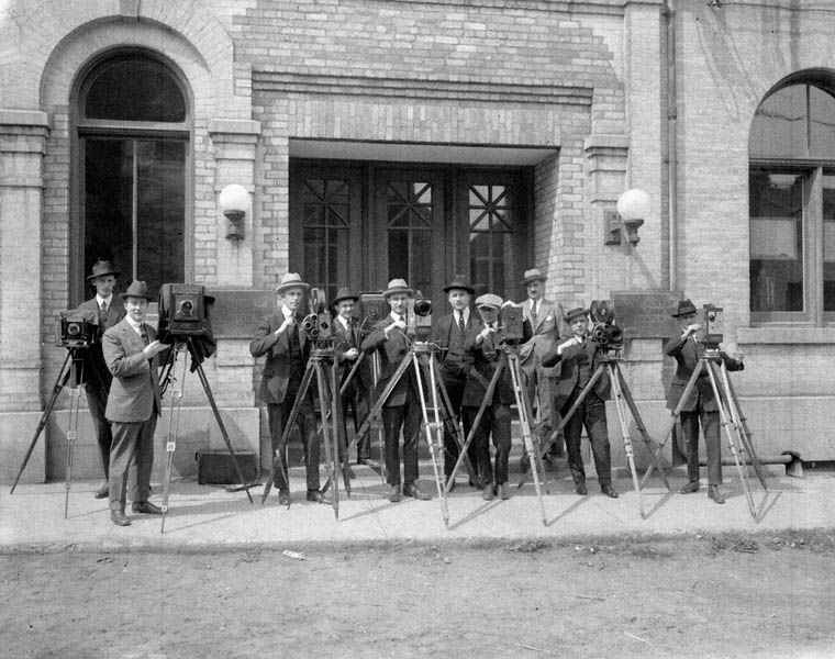 Cameramen outside the Canadian Government Motion Picture Bureau